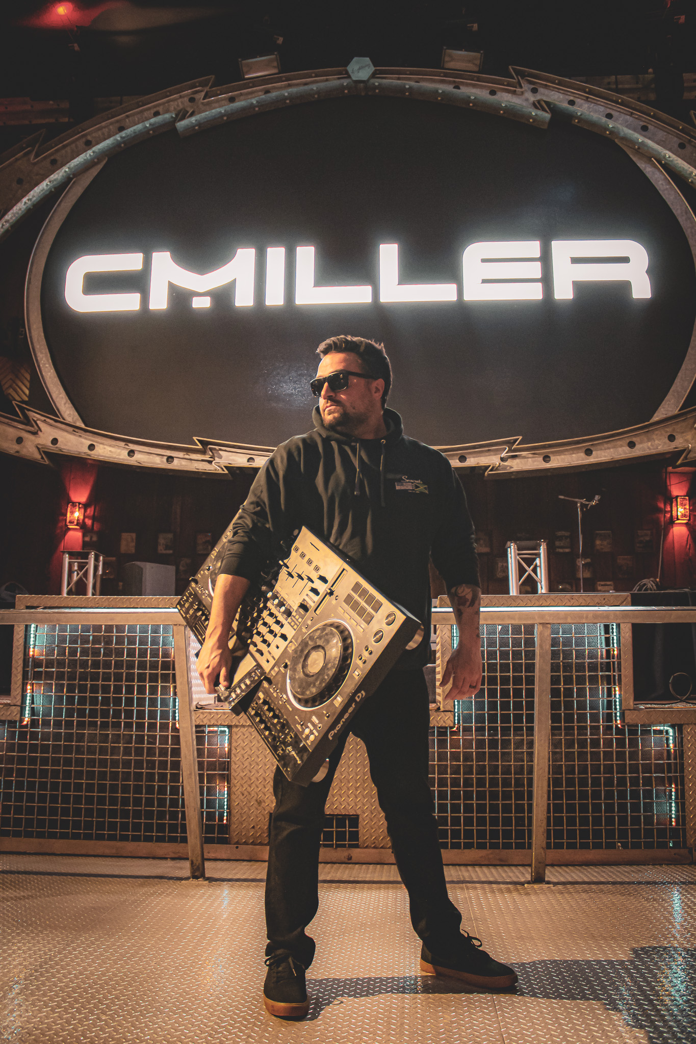 Man standing with a boom box