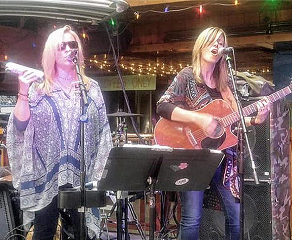 Two ladies singing